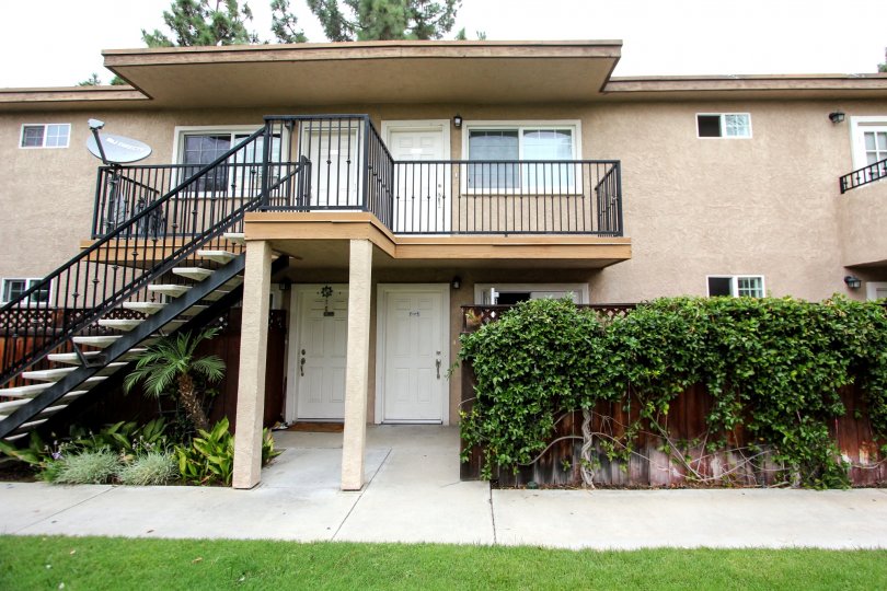 VERY BEAUTIFUL HOUSE. IN FRONT OF IT THERE IS A LAWN. GREENERY IS EVERY WHERE.