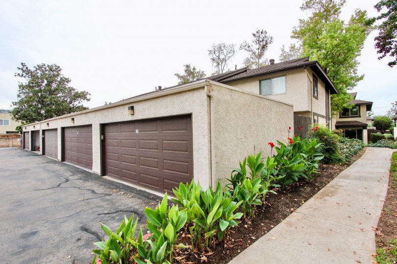 Garages behind residential units at Mollison Villas in El Cajon California