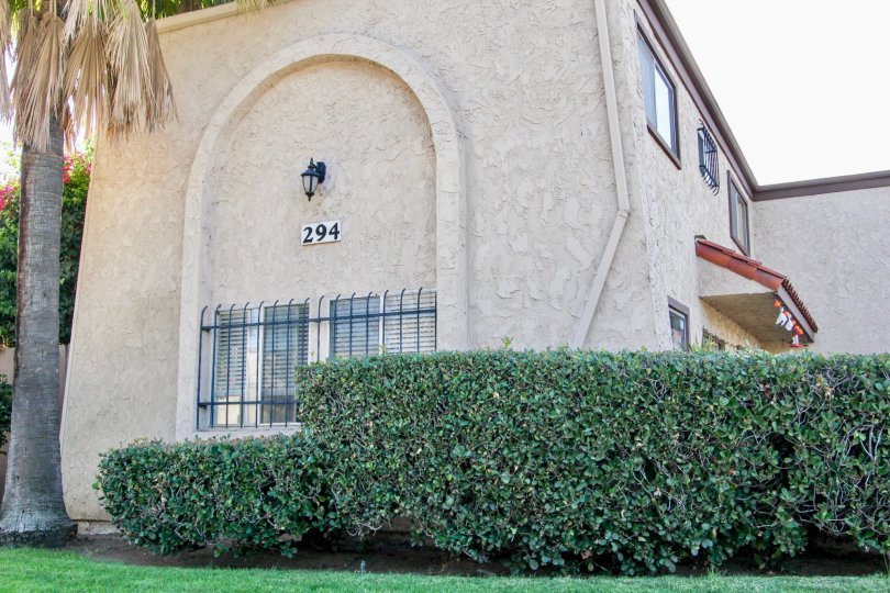 Clay colored house with the number 294 in the Park Lane community.