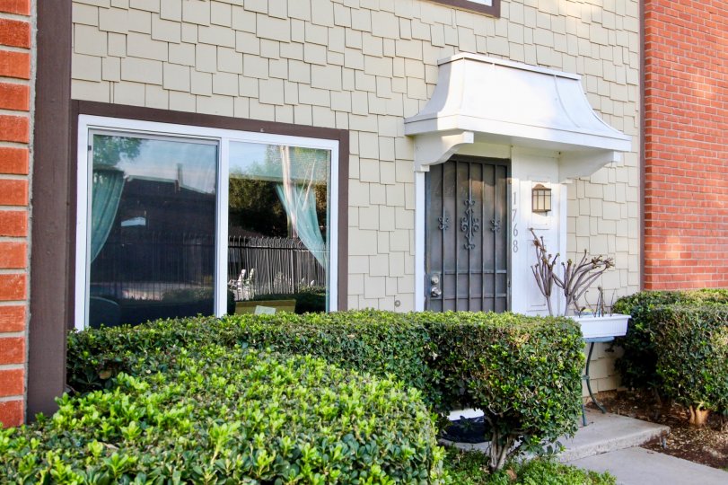 Pepper Drive Estates El Cajon California house with large windows and steel doors
