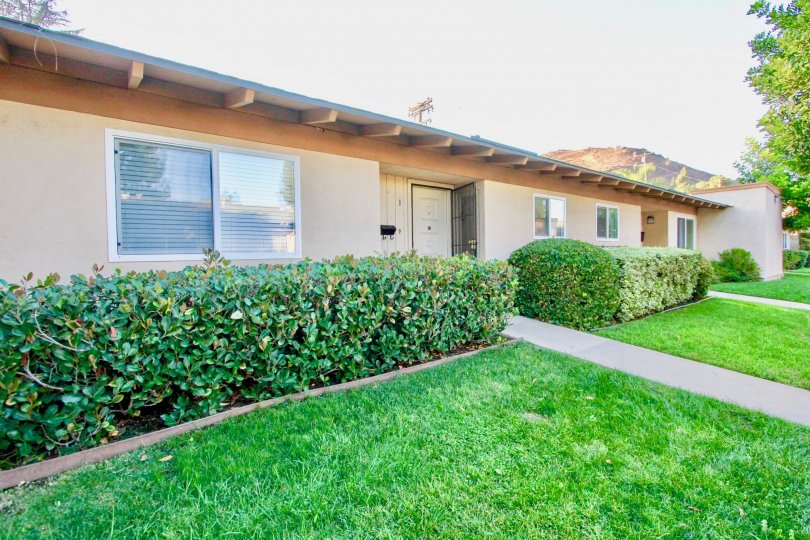 Housing with yard and walkway at Winter Garden Village in El Cajon California