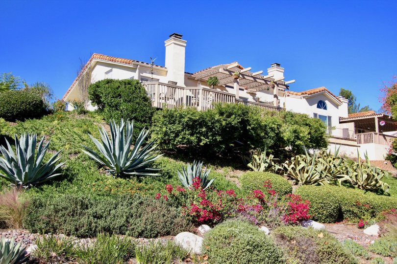 Overlook the beautiful landscaping from your deck at Castle Creek Villas.
