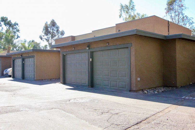A couple of garages with gray doors in Sommerset Woods neighborhood