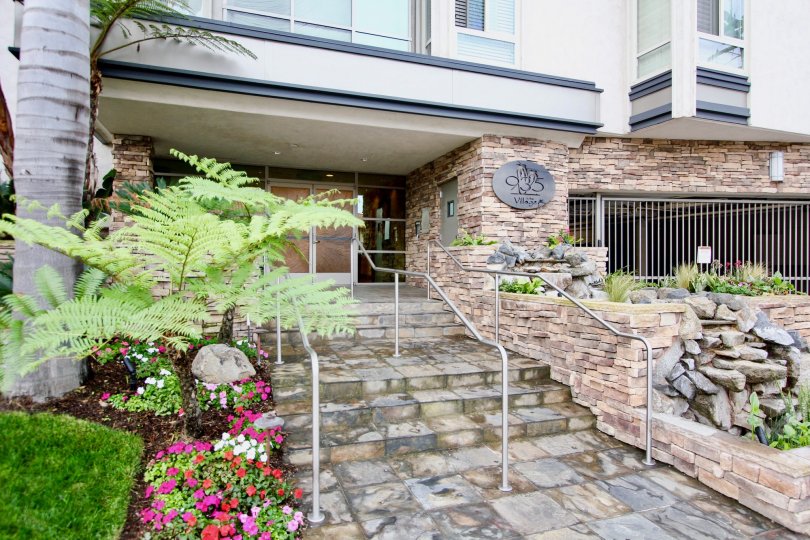 Stone walkway leading to residence inside Chateau Girard in La Jolla CA