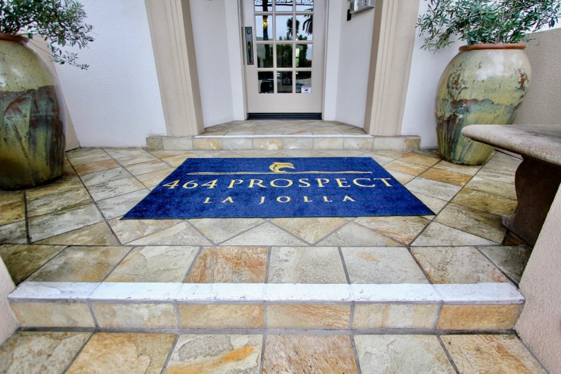 IN entrance, Mat has " 464 prospect la jolla" lines in the La JOlla Prospect Condos