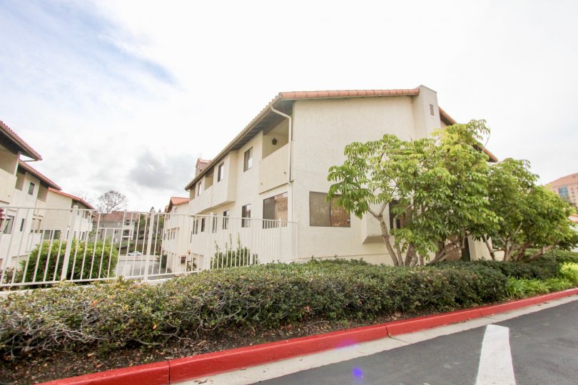 A sunny day at the La Jolla Village Tennis Club, apartments, gate