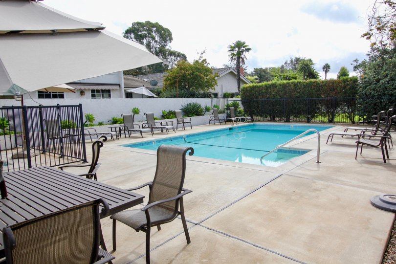 Large swimming pool with gray sets inside the La Jolla Woods in La Jolla CA