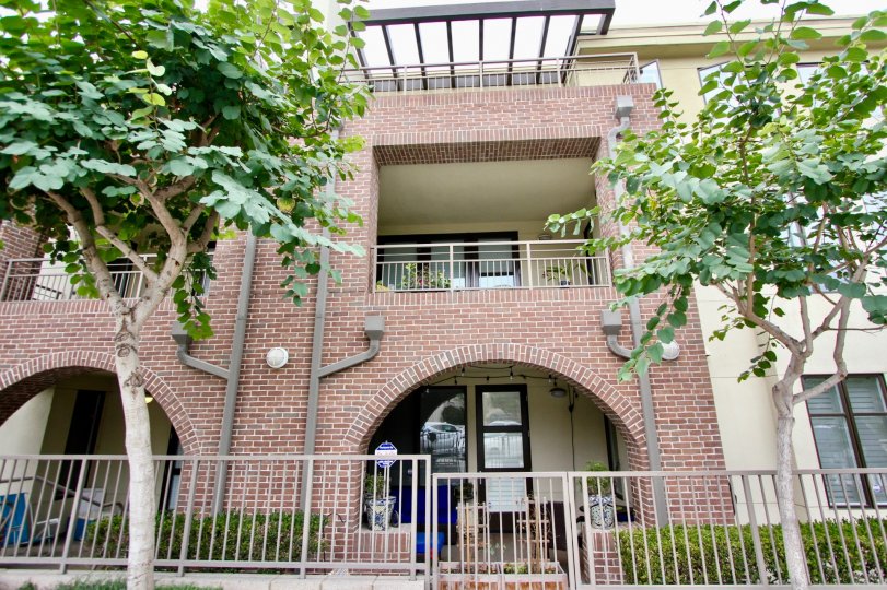 THE APARTMENT IN THE SEAHAUS WITH THE BRICKS WALL, STEEL GATE, BALCONI, FLOWER POT, TREES, PLANTS