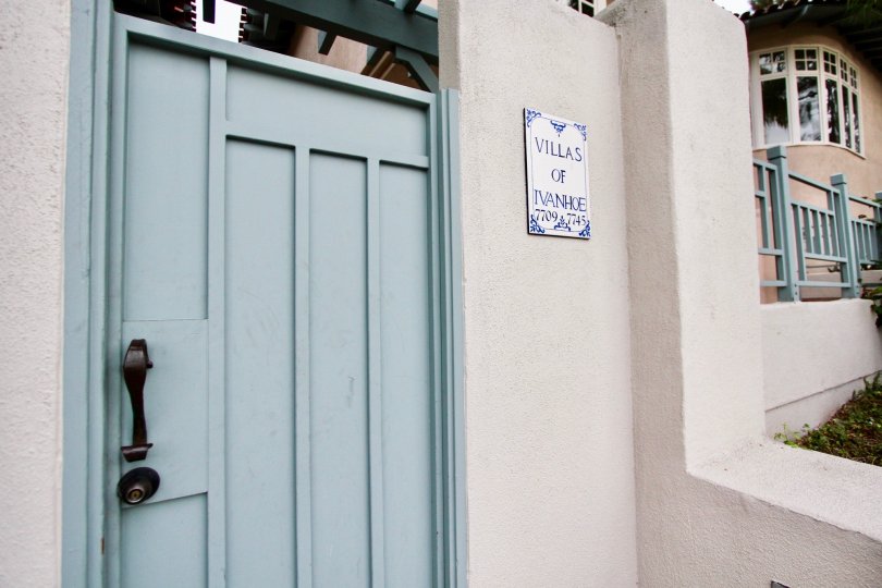 Blue door with a black handle at Villas of Ivanhoe in La Jolla CA
