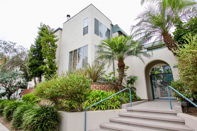 Fancy arched entrance with black gate in Wind N Sea in La Jolla CA