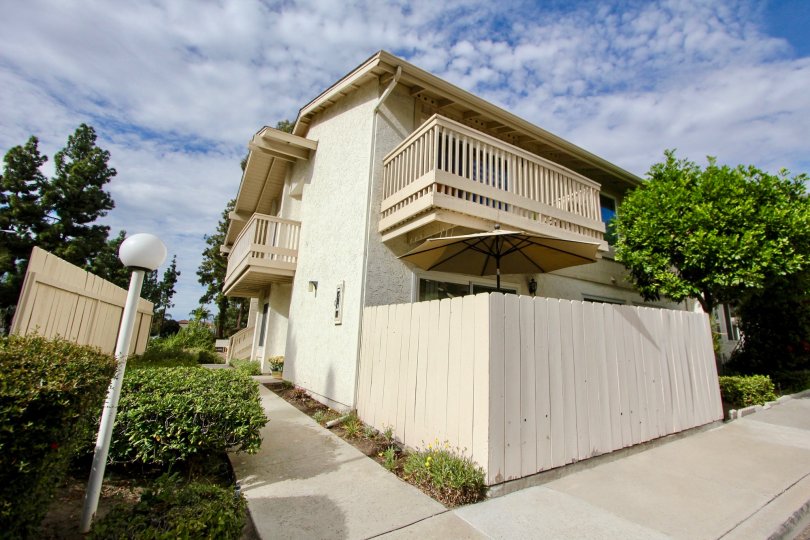 Excellent view of a villa with trees around in Hillside Village of La Mesa
