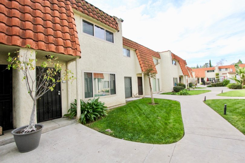 a warm day in the tangerine terrace with a contiues villas all that is attached with a garden