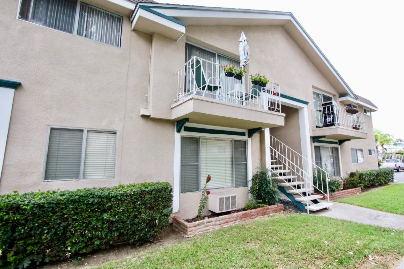 A two story pink Westwood Village building in La Mesa California