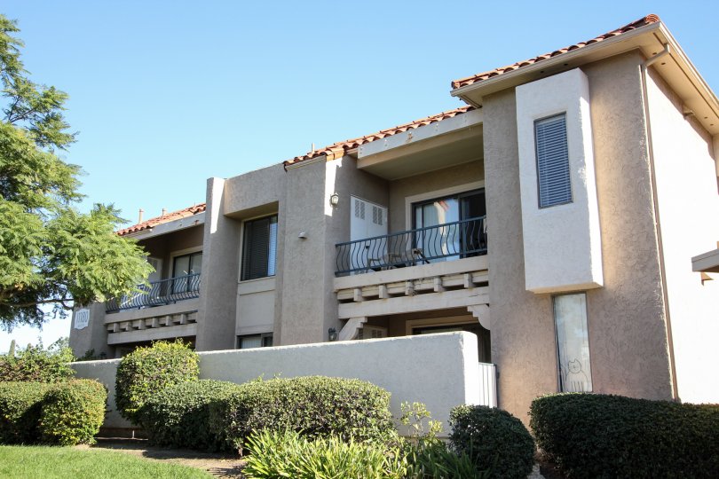 Two story residential units with cement wall at Flair in Mira Mesa California