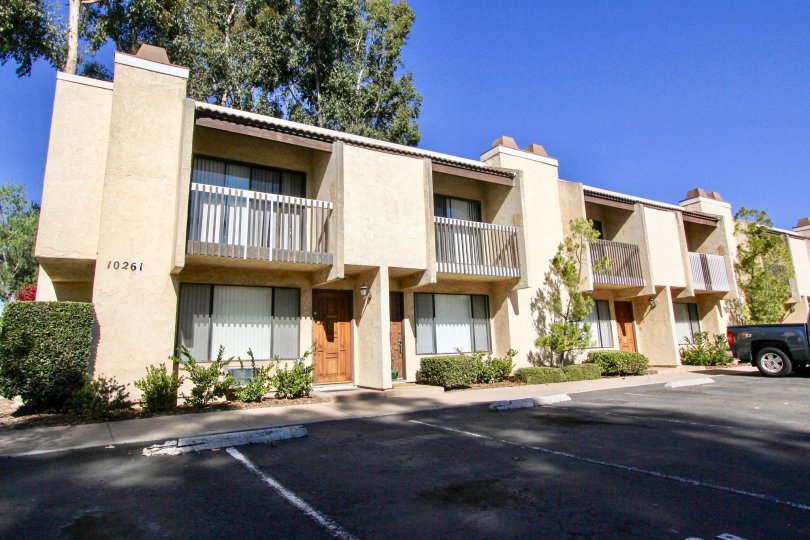 Parking area near a two story residential building at Gold Creek In Mira Mesa California