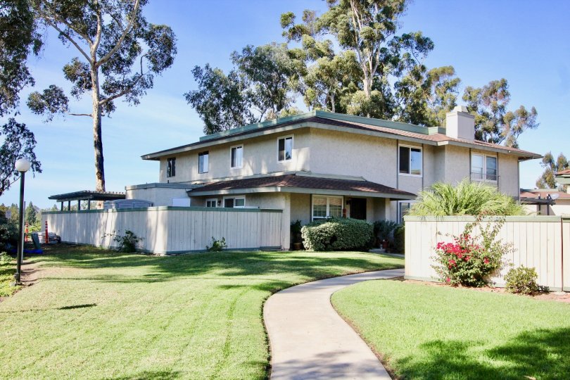 Two story housing units with large patio and green yard at Quest in Mira Mesa California