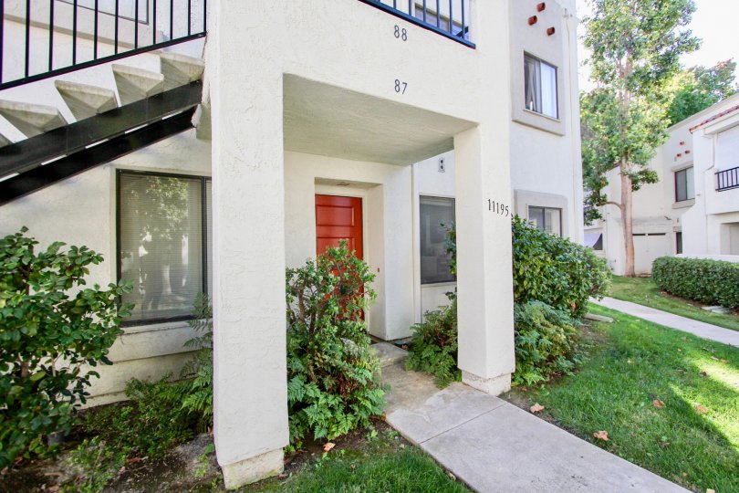 Apartment 87 of Villas at Capricorn showing a red door