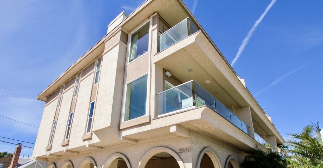 The glass balconies on 3500 Bayside Walk in Mission Beach CA.