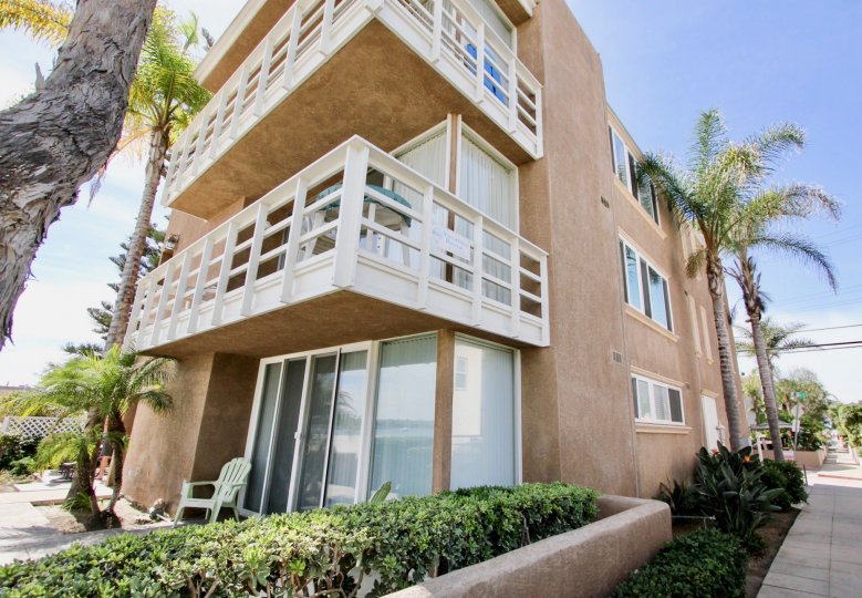 Three story pink & white condos at Bayfront Youngson in MIssion Beach CA
