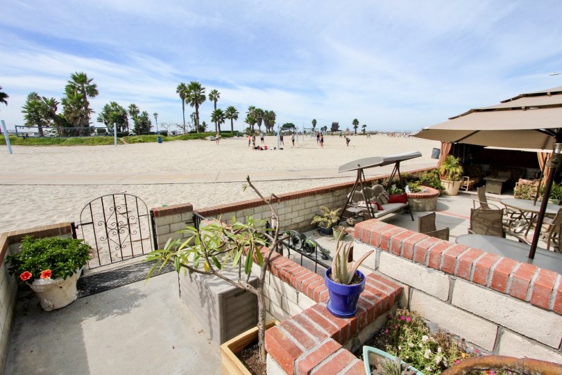 Residence with a small gate that leads to the beach at Ocean Blue in Mission Beach CA