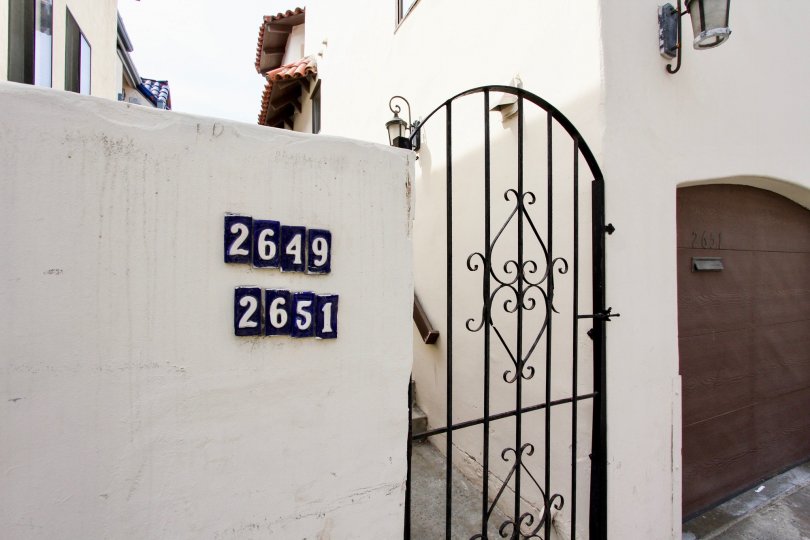 The exterior entrance of 2649 and 2651 Ocean Blue gate and garage in Mission Beach