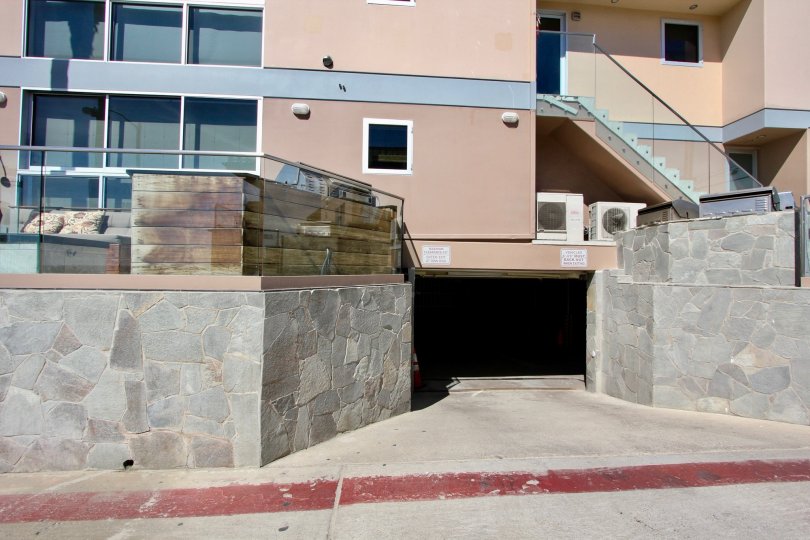 Looking DOwn the Driveway into the parking garage at the San Juan Condominiums in Mission Meach, CA