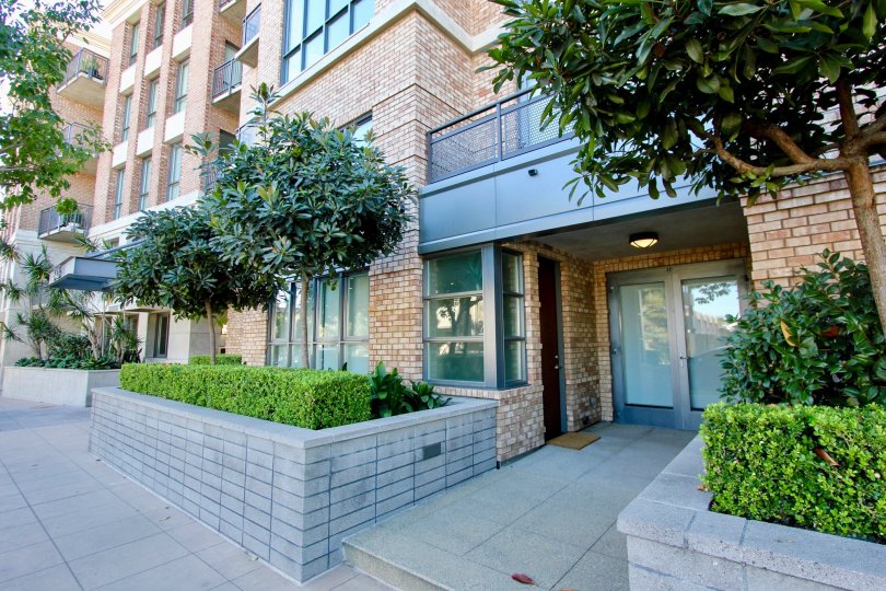 1Mission, City: Mission Hills, The entrance of the building with beautiful balcony and nice brick walls and classes
