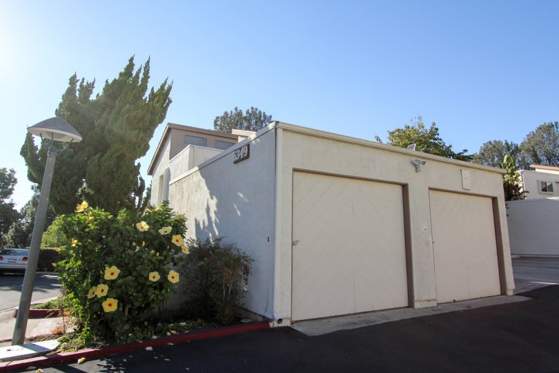 Adorable little house in the Cerro De Alcala community of Mission Valley, California, with 2 garage doors.