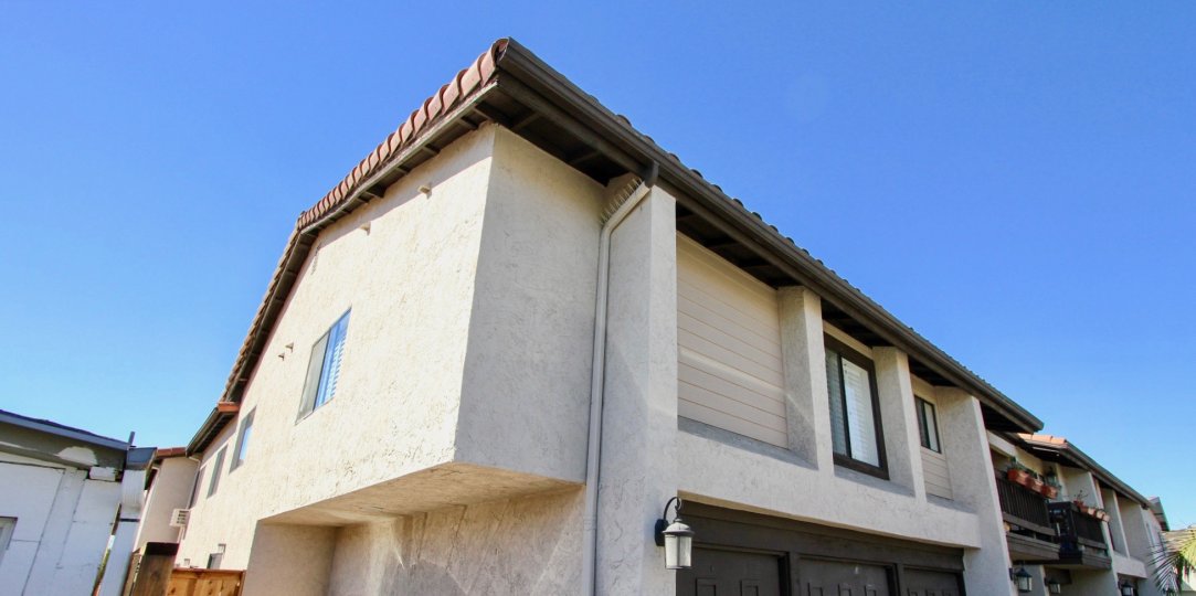Two story white condominiums in Normal Heights at Garden Heights CA