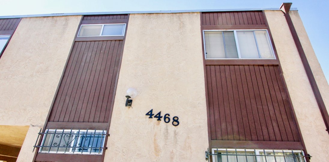 A sunny day in the area of Teralta Heights, windows, house number, light, bars, roof