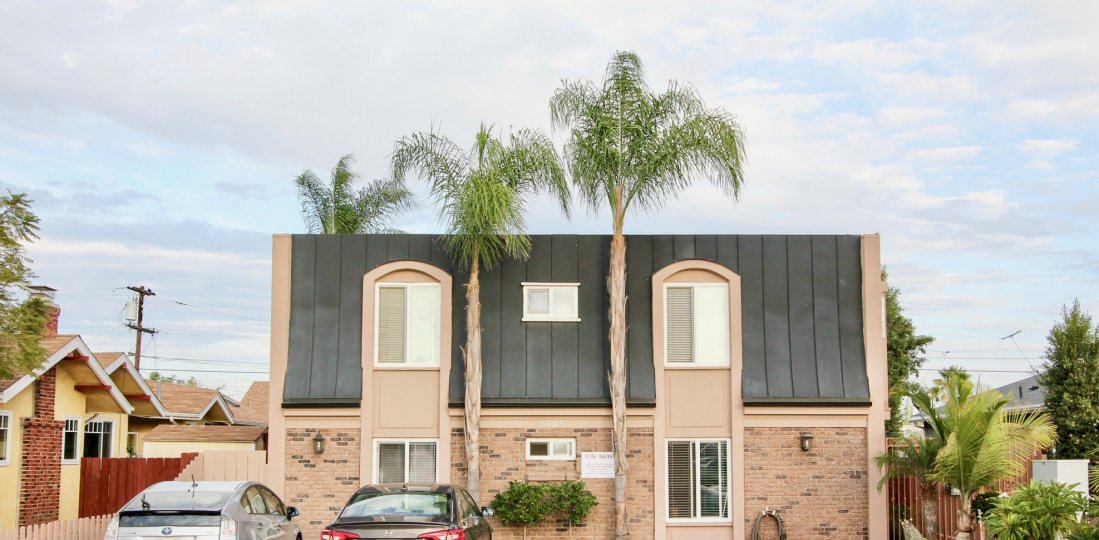 3345 29th St, City: North Park, building backside with trees and the cars parked beautiful view