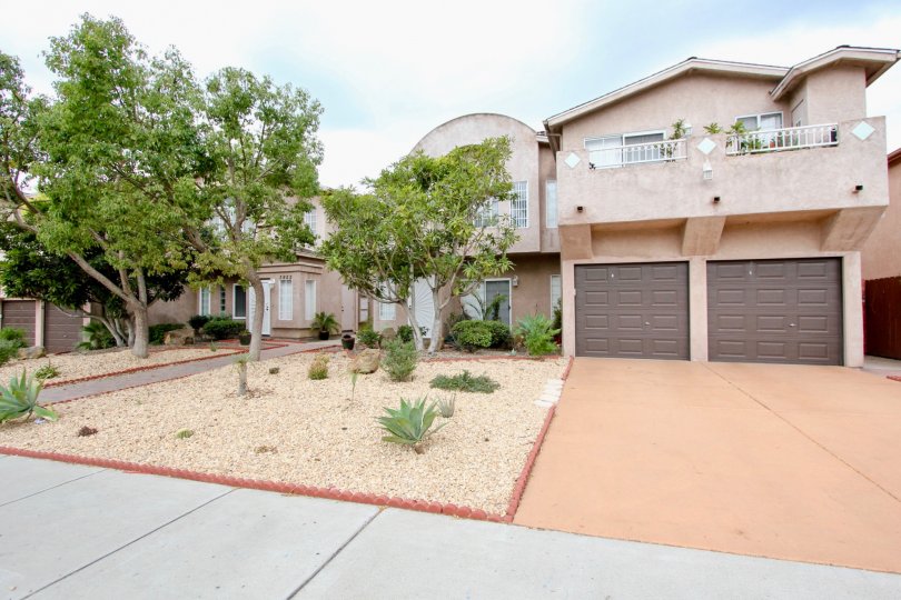 Cameo in North Park, California has a desert stucco theme to the housing while plants line the terrace outside