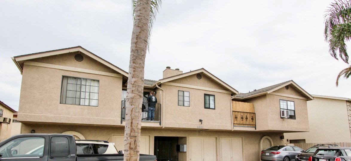 Housing with garages and driveway at Casa De Lee in North Park California