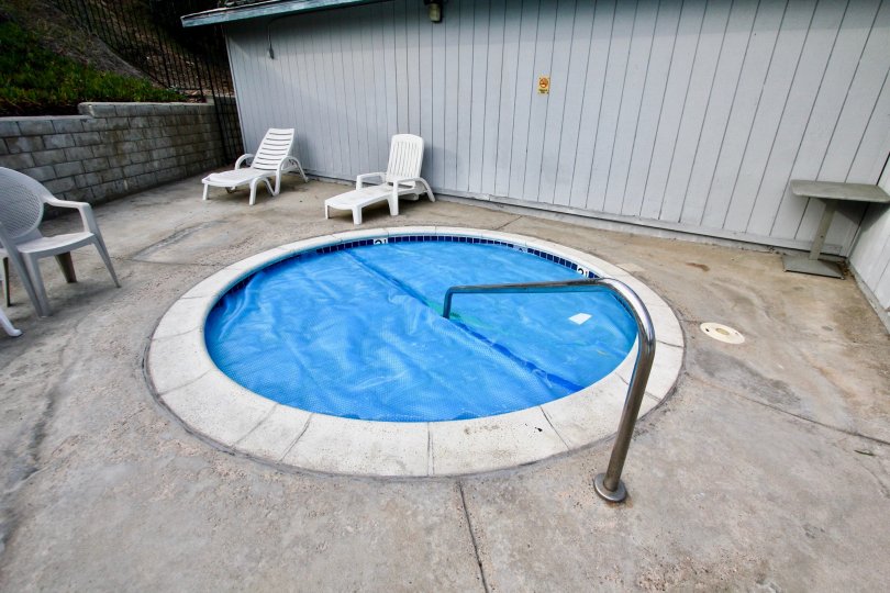A villa in Cherokee Canyon has swimming pool and chairs