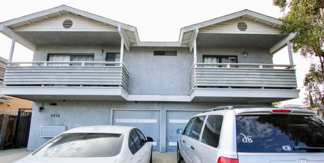 Front of duplex of Cherokee Oaks neighborhood with dual garage
