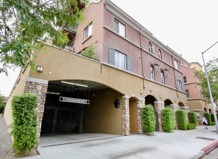 A sunny day in the area of La Boheme, apartment building, street, gate