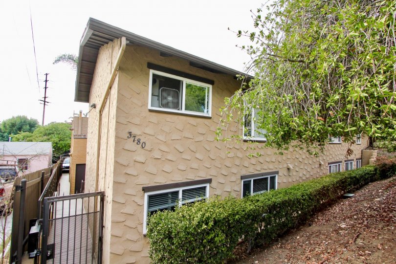 Two story residential units near a hillside at Las Casitas in North Park California