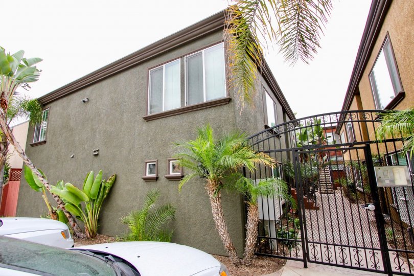 Front view of landscape and entry gate at The Milano in North Park, CA