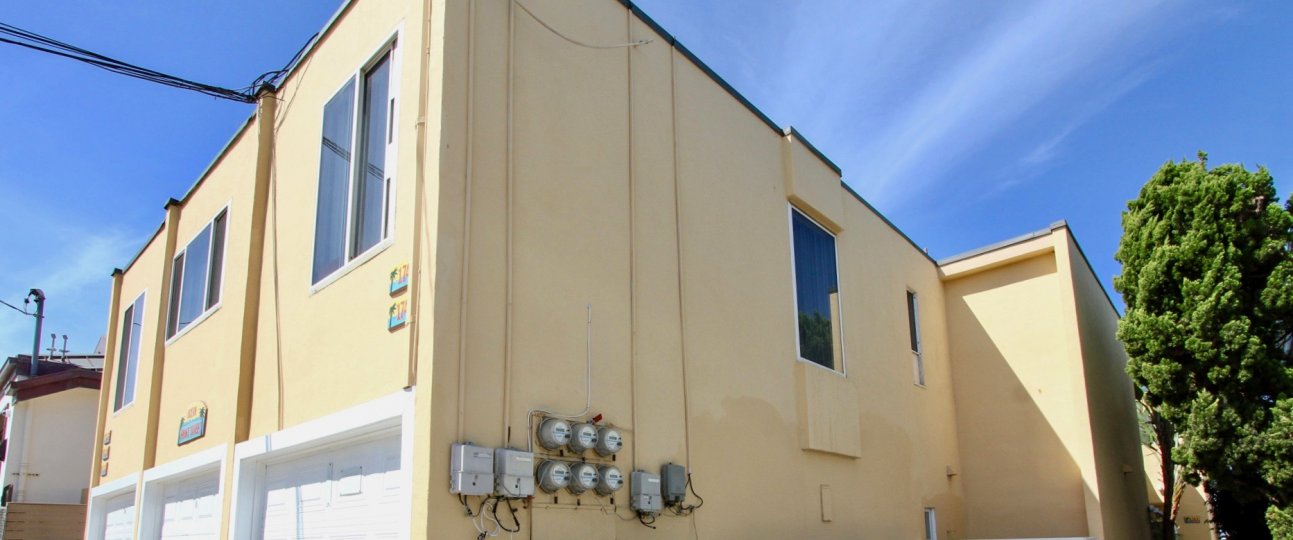 Side view of the building with trees and plants in Cliff House