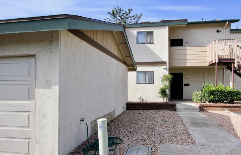Apartment complex with garage in mission vista with stairs in a warm area