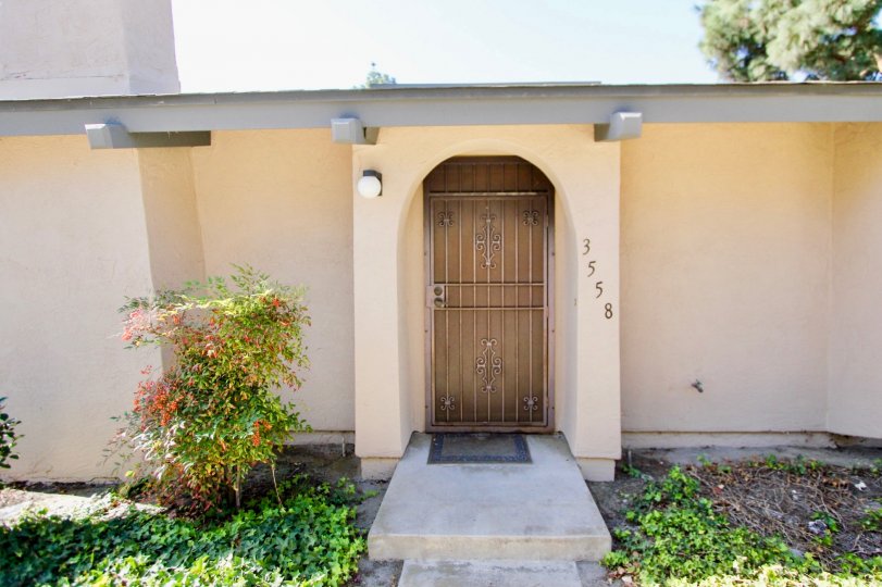 Brown security door at the entrance at the home in Orchard Lane in Oceanside CA