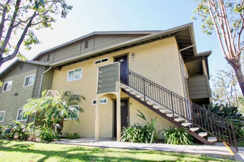 Brown iron stairway leading to a residence at River Trail in Oceanside CA