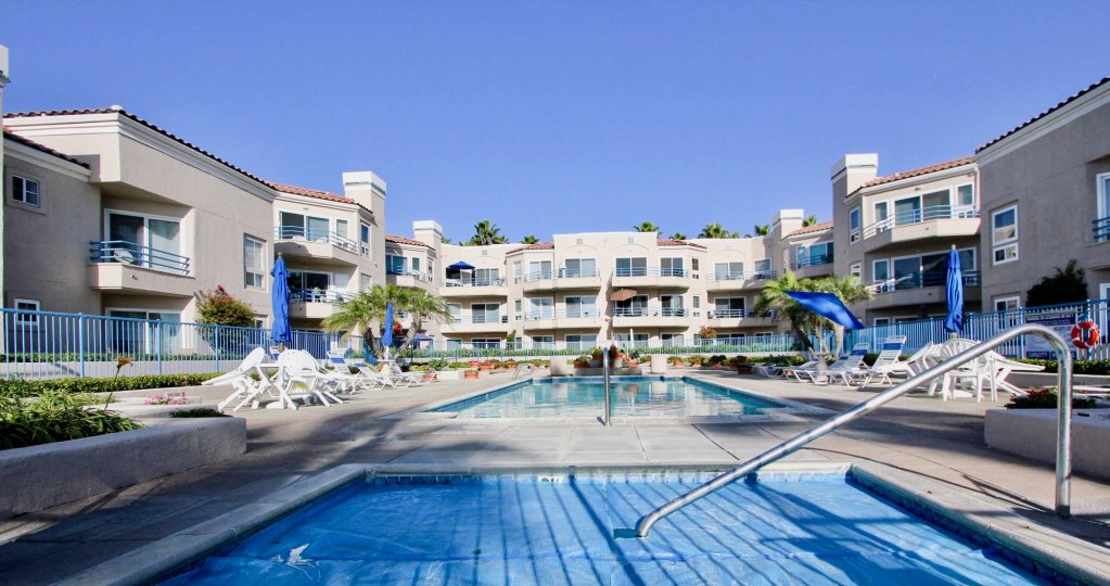 Large pools and outdoor living space for sunny afternoons at San Miguel IV.