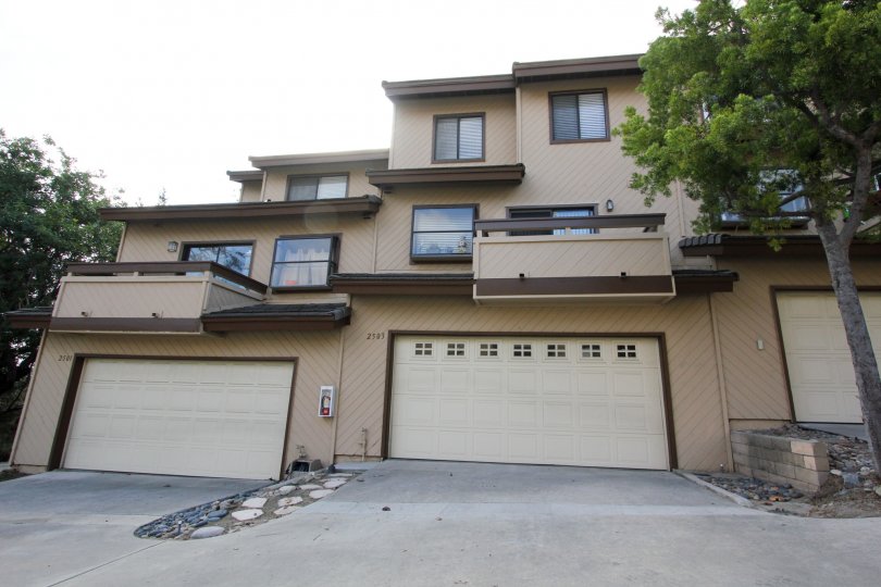 Wide garage doors sit on two car garages at the Woodland Ivy.