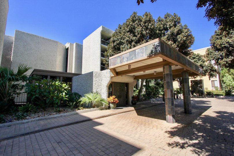 A left-side view of the Bay Scene community drop-off with decorative tiles.