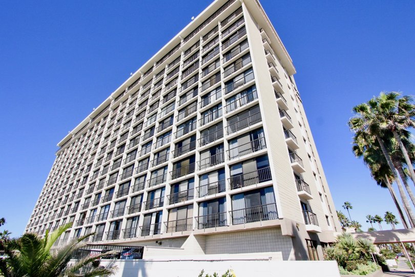 A mid-rise contemporary housing in the Capri by the Sea community with balconies.