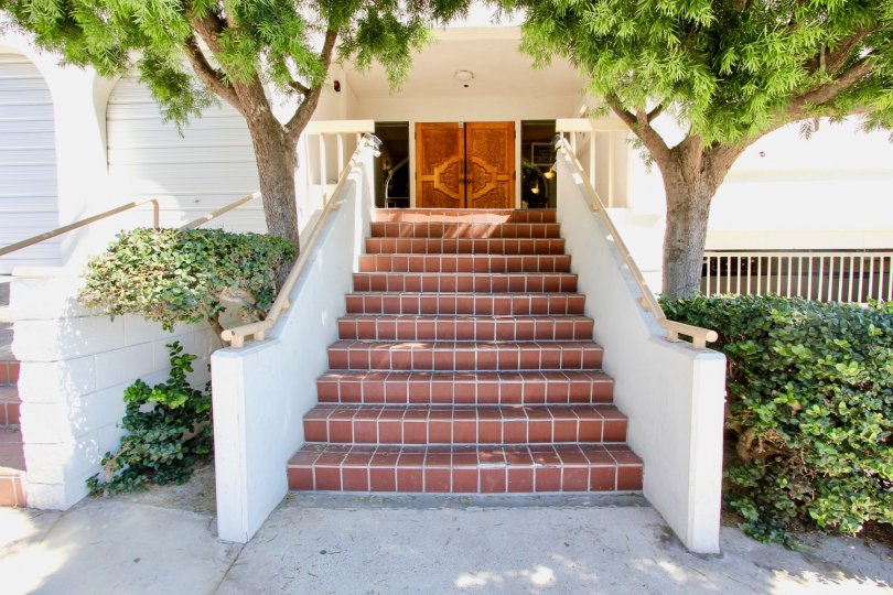 Front entrance gate view with staircase of Castaway community residence, Pacific Beach, CA