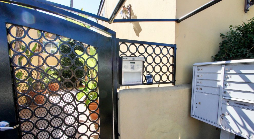 Gate and gate code box on reed Pacific Beach California