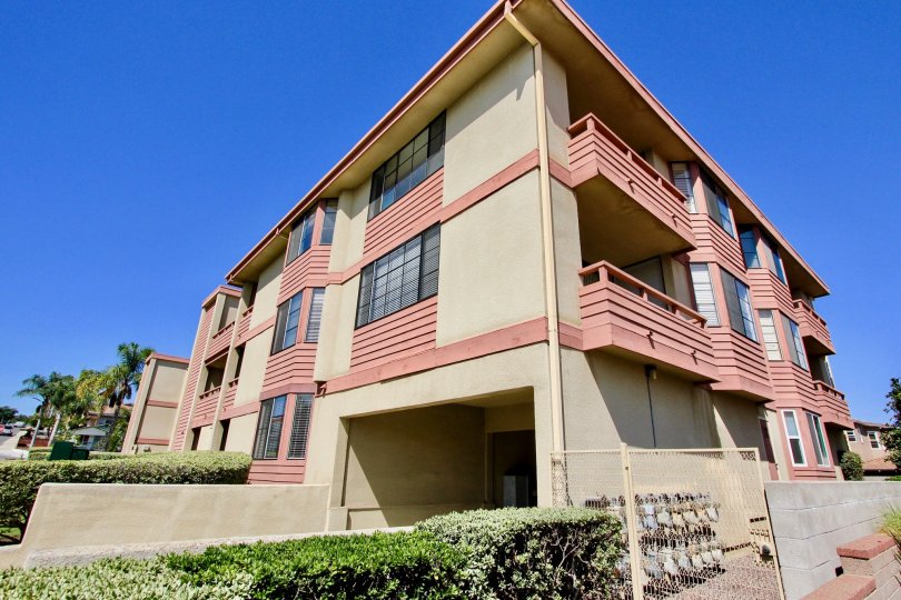 Addisoton Street apartment complex in Point Loma, CA on a sunny day.