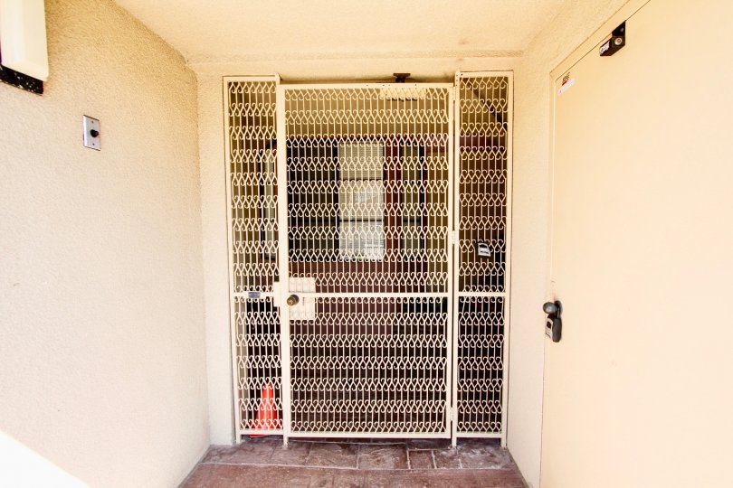 THE HOUSE IN THE Addison STREET WITH THE STEEL GATE, BELL, SWITCH